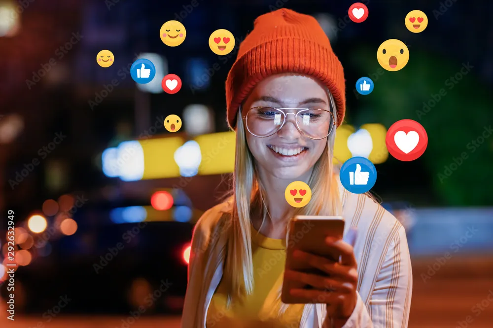 Content creator interacting with social media reactions